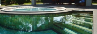 Pool Design. Outdoor pool - Fringe of the whirlpool and steps in Yellow and black Quartzite.jpg
